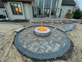 Professional concrete contractor work - elegant outdoor fire pit installation in Loch Lloyd, MO