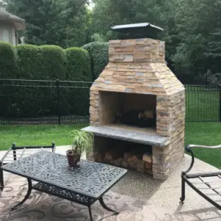 Outdoor wood burning fireplace