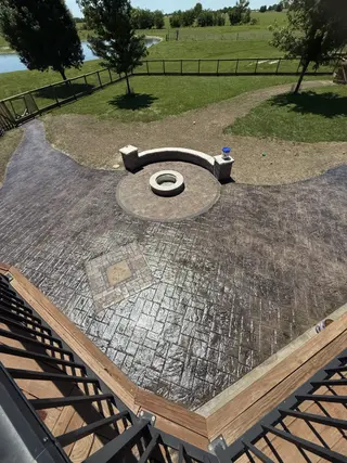 Stamped concrete patio Kansas City with ashlar slate pattern and built-in fire pit