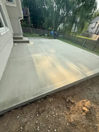 Broom finished backyard concrete patio in Shawnee, Kansas