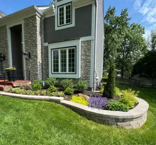 Decorative concrete patio with seating wall by Leawood concrete contractor