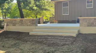Concrete patio steps connecting outdoor levels in Mission