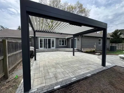 Backyard concrete patio with clean finish in Kansas City