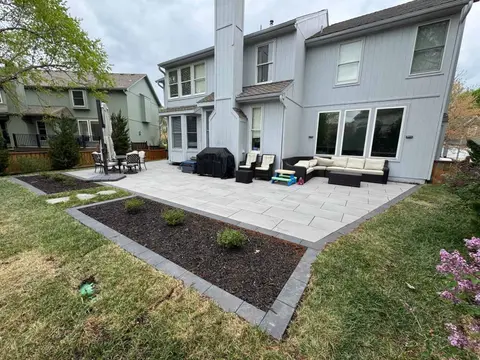 Concrete patio installation in Kansas City backyard