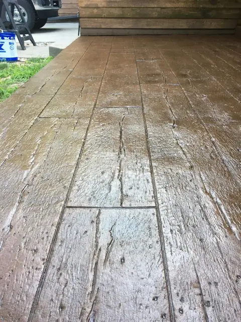 Wood grain stamped concrete patio