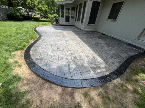 Stamped concrete patio with colored border