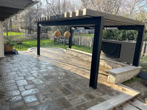 Concrete patio with pergola in Kansas City